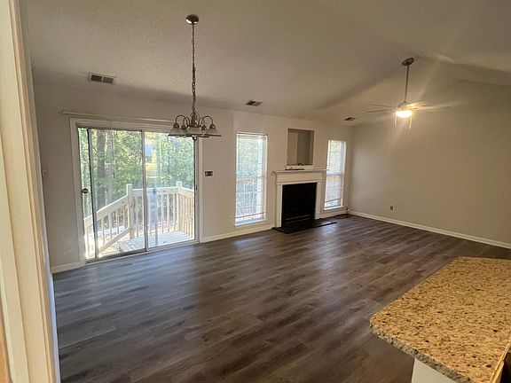 Kitchen opens to dining area and living room.