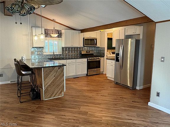 2nd image of 8701 Mayfield Rd Lot 148