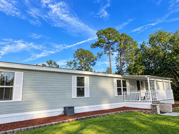 8809 TREASURE ISLAND ROAD, LEESBURG, FL 34788