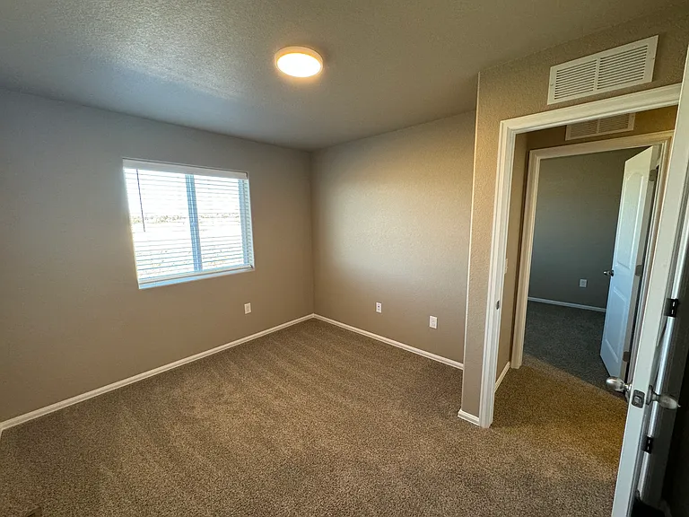 Secondary bedrooms with mountain view