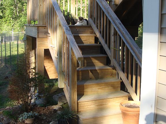 Steps lead 2 deck & Kitchen.