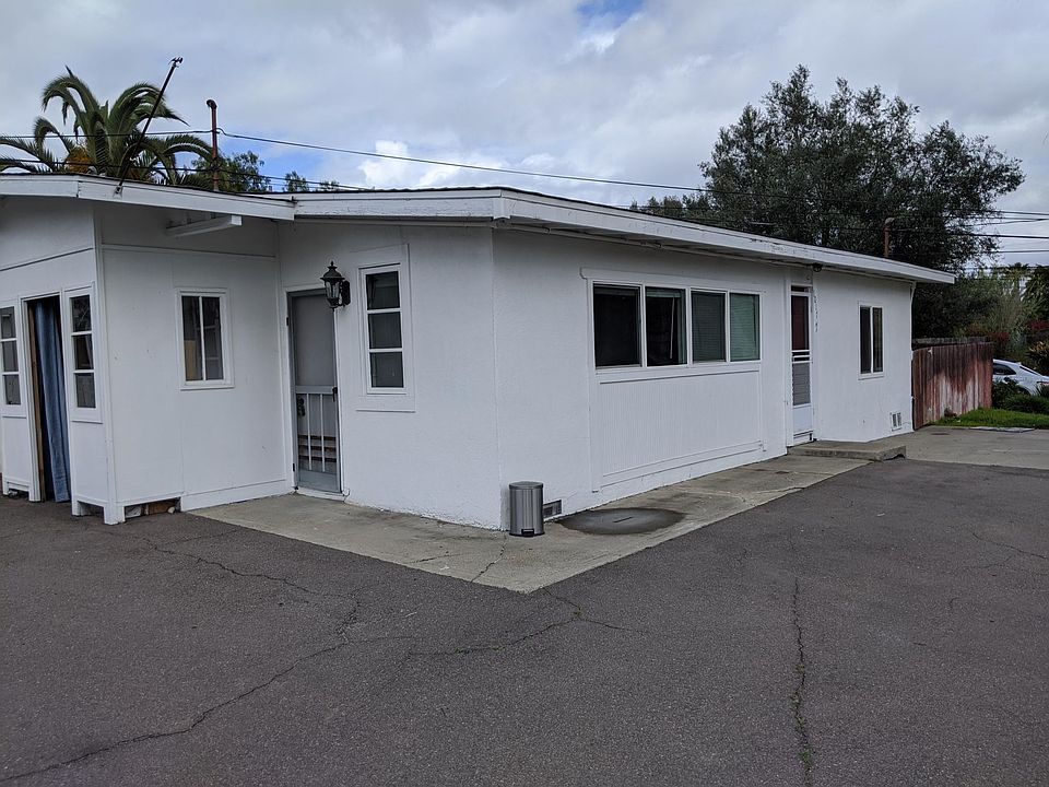 Entry to the living room, and entry to the kitchen.