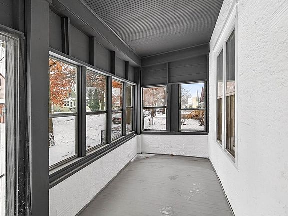 Shared porch with downstairs unit, different angle