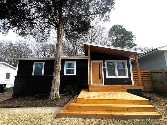 House sits up on a hill that provides even more privacy from the street.