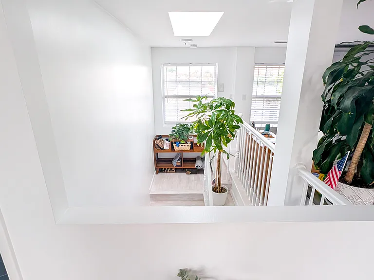 View from the living room to skylight and staircaise/entrance