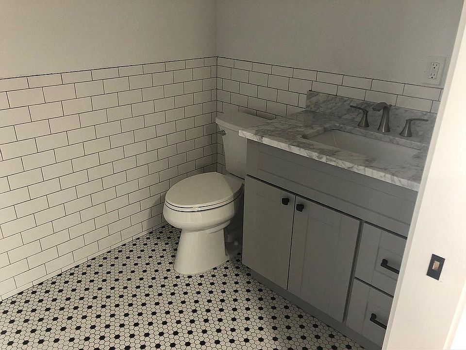 Main house has New bath with new flooring, plumbing and fixtures.