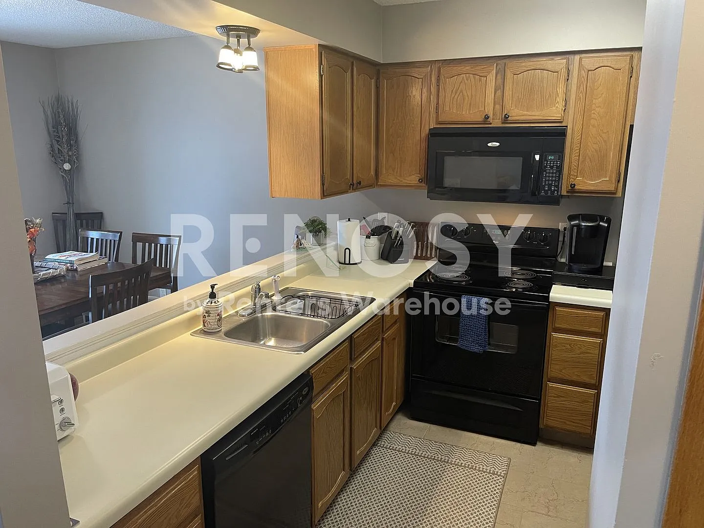 Spacious 3 Bedroom Townhome with Garage, Fireplace & Private Patio | 24 Elton Ridge Ct NW Unit #2... — Photo 2