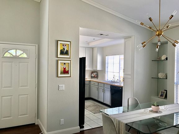 Vaulted ceilings with new crown molding.