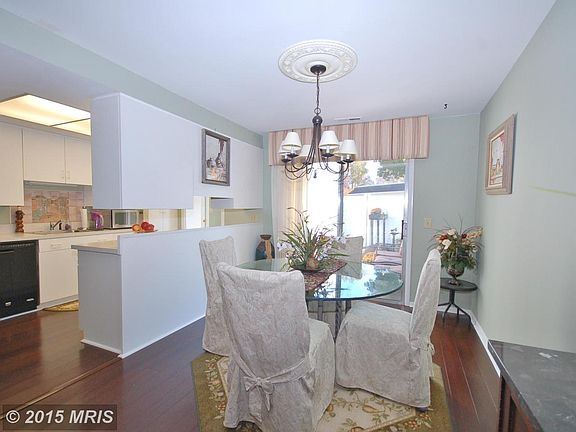 Dining Room open to kitchen with sliders to patio