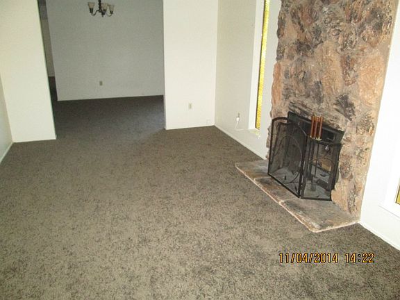 New carpet, Fireplace in Living Room