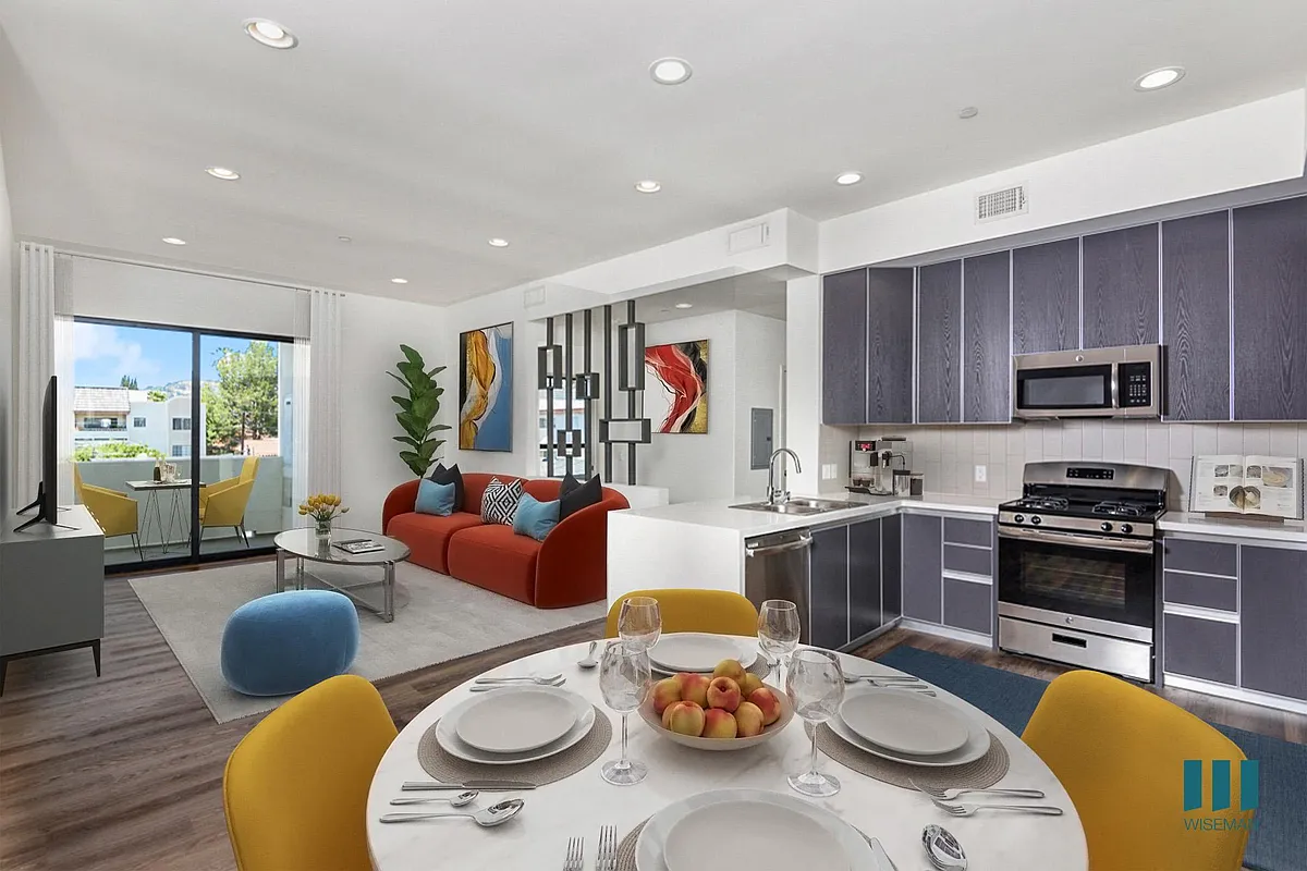 Open-Concept Kitchen, Dining, and Living Room with Patio - Martel Flats by Wiseman