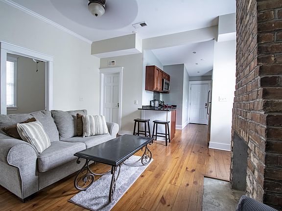 living room (open door to small bedroom)