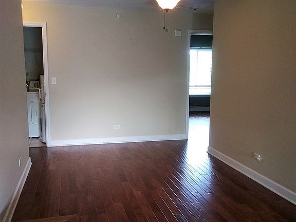 Spacious dining room with new wood floors