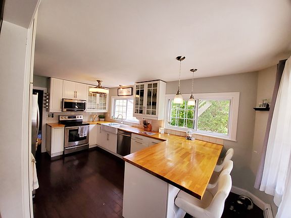 To a bright kitchen.  