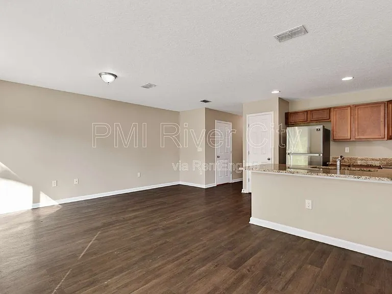 7608 Rain Forest Dr N — Photo 5