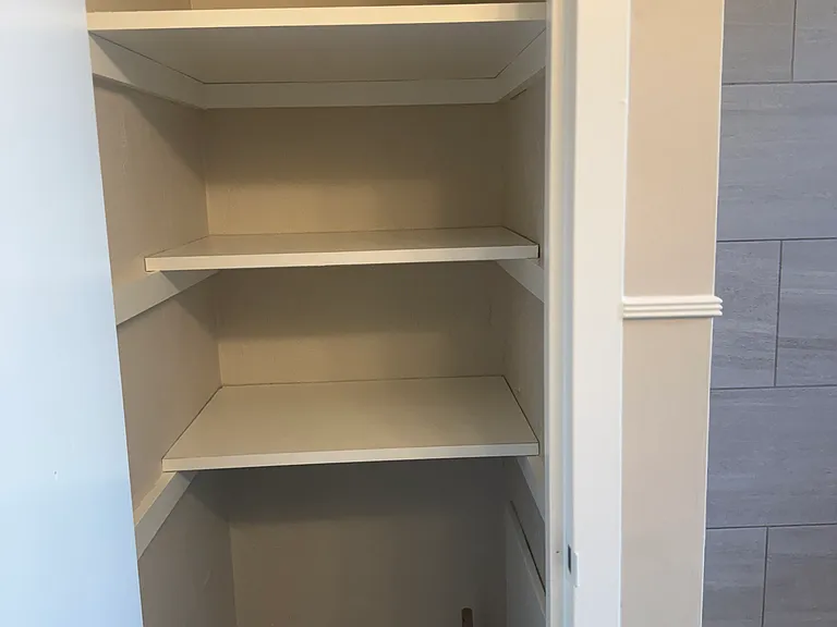 Bathroom linen closet.