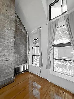 5th image of 40 E 12th St APT 1A