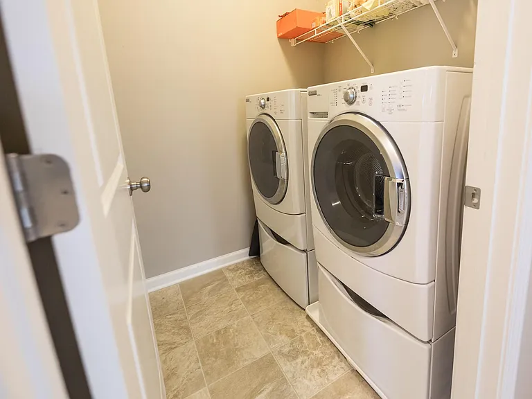 Upstairs laundry room. Washer and Dryer included.