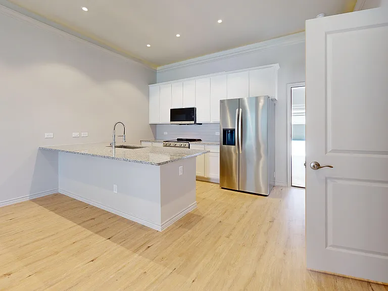 Kitchen with Stainless Steel Appliances and Granite Countertop