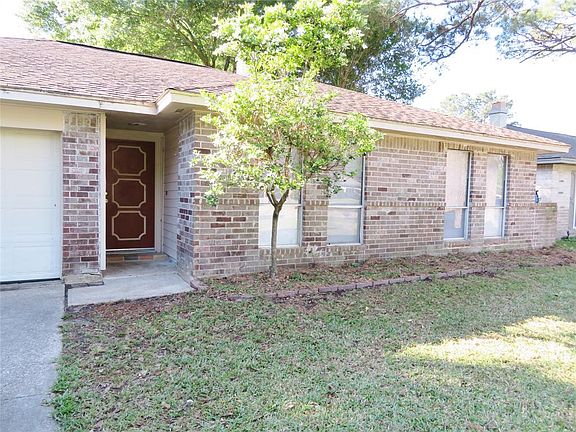 Covered Front Entry with Solid Wood Door