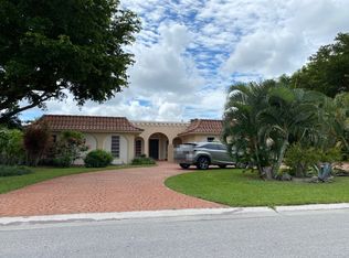 356 S Country Club Dr, Atlantis, FL 33462