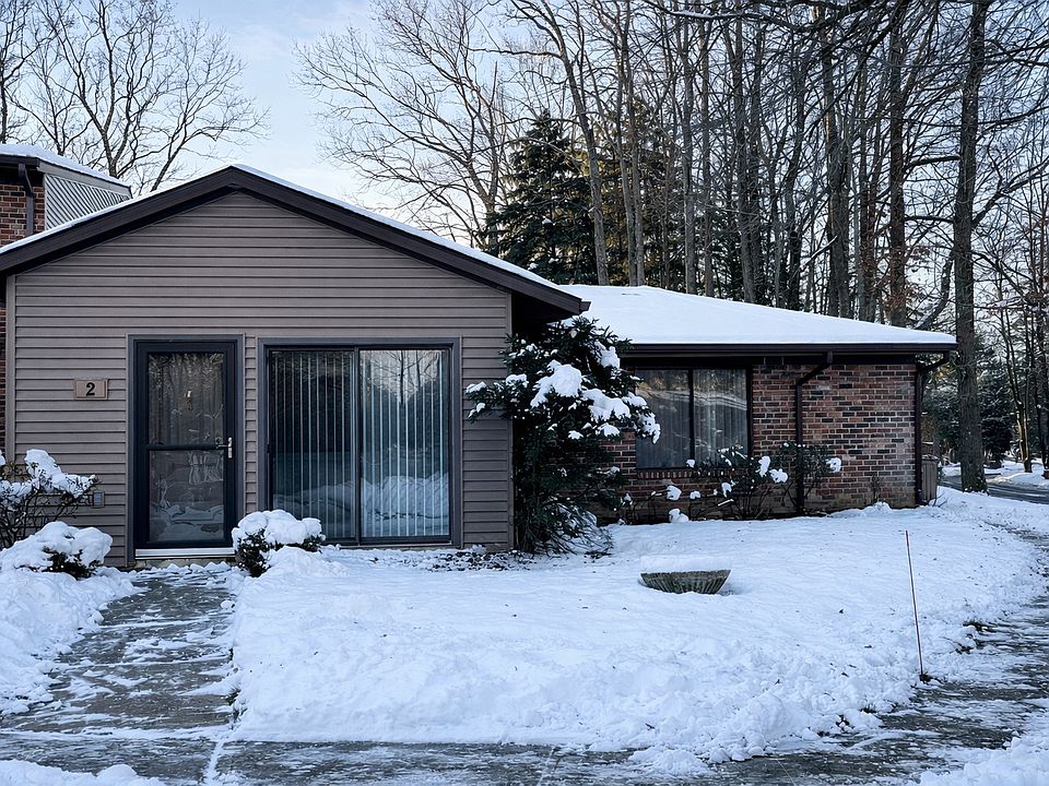 Private ground-floor beautiful corner townhome set within the scenic, gated Shadow Lake Village 55+ community, surrounded by beautifully landscaped grounds and walking paths.