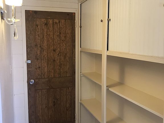 Back door and extra storage area.
