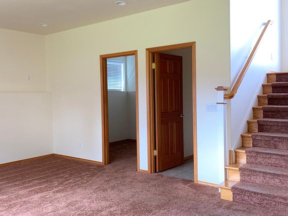 Family room, small bedroom, storage room downstairs