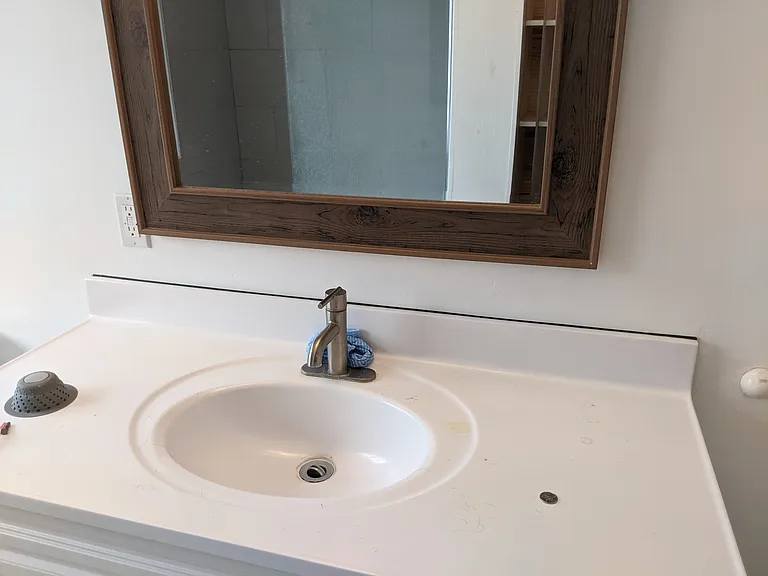 Main bathroom vanity provides lots of storage for you and your kids personal items.