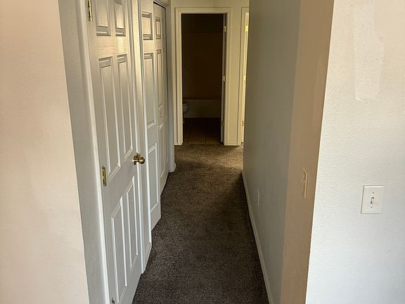 Hallway with Washer and Dryer hookups