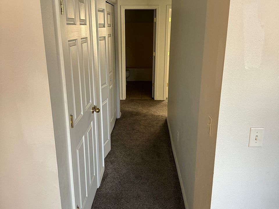 Hallway with Washer and Dryer hookups