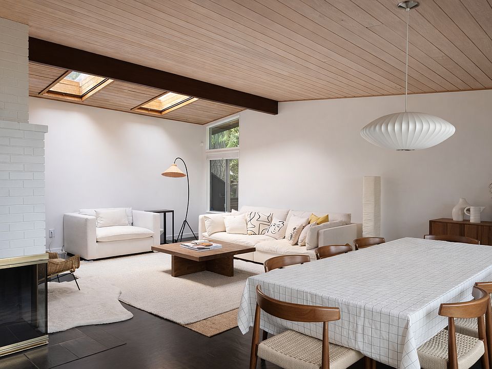skylights with lots of light throughout the day. brick fireplace.