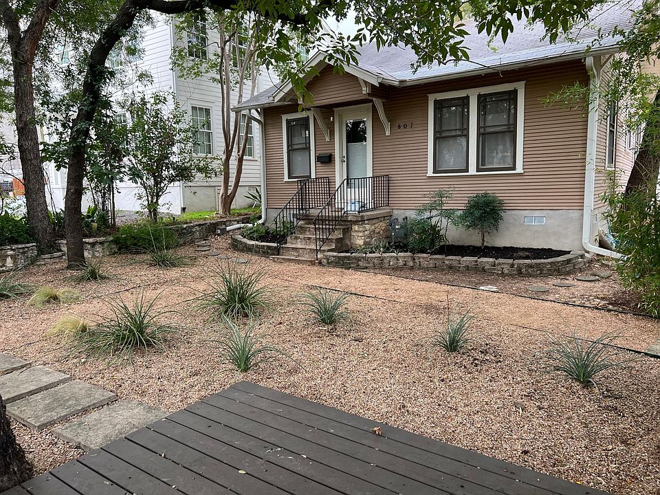Stand alone house in heart of Clarksville. Front yard with deck pictured here.