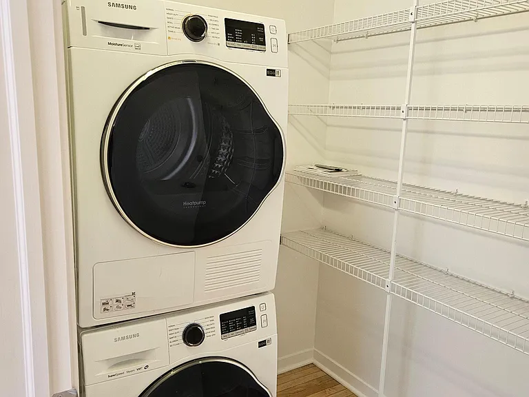 Walk in closet, second bedroom, with laundry