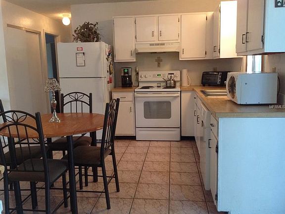 4th image of 11023 Longhill Dr N