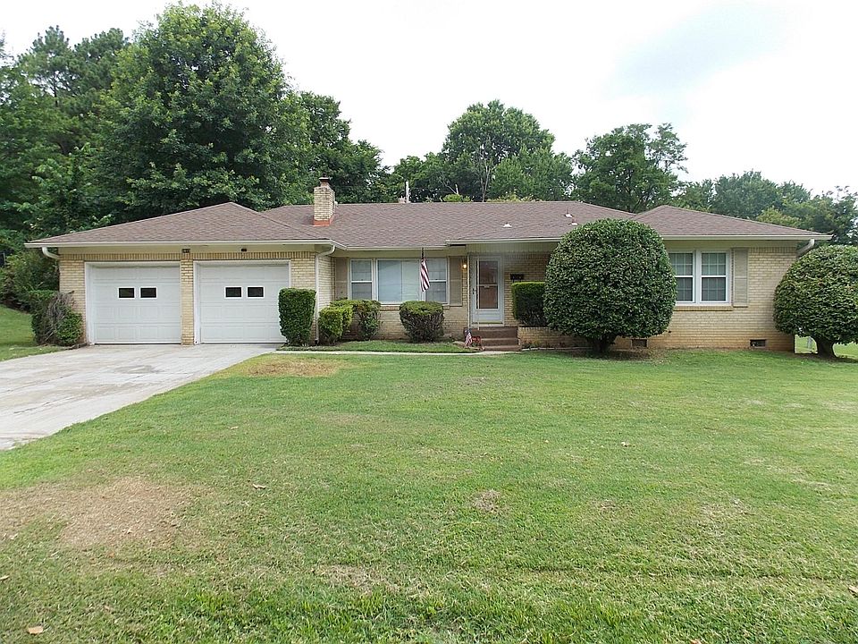 Front of House, with 2 car garage- New Roof and Brick Home- Quiet Neighborhood.