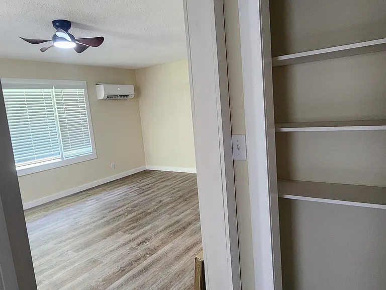 connecting corridor with linen closet.