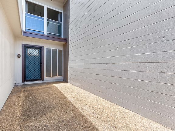 Privated gated front lanai for a private entryway.