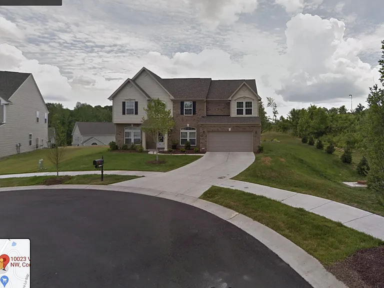 10023 Violet Cannon Dr NW — Photo 1
