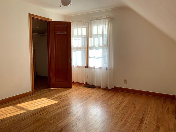 Eastern upstairs bedroom 11'X10' with walk-in closet.