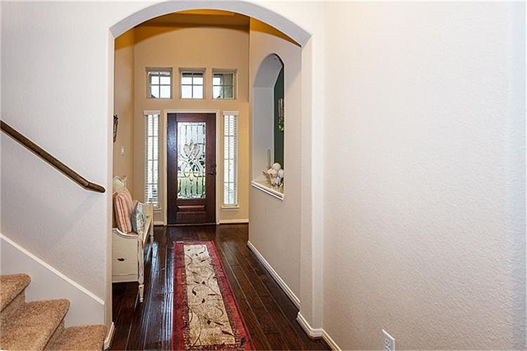 Beautiful Entry with transom windows that allow for an abundance of natural light!