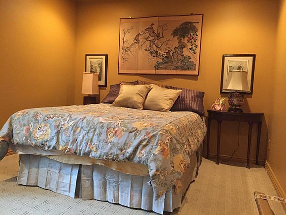 guest bedroom with queen bed