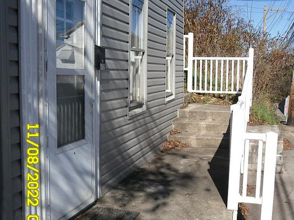 Front Entrance and walkway to rear of house