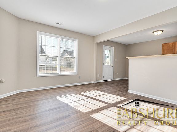 First floor living room with luxury vinyl plank flooring