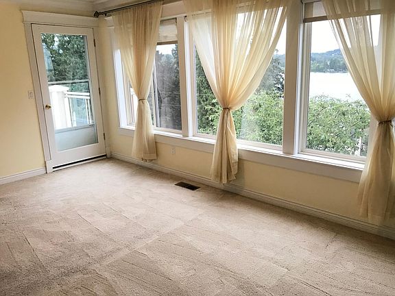 3rd bedroom with closet, shared deck and view