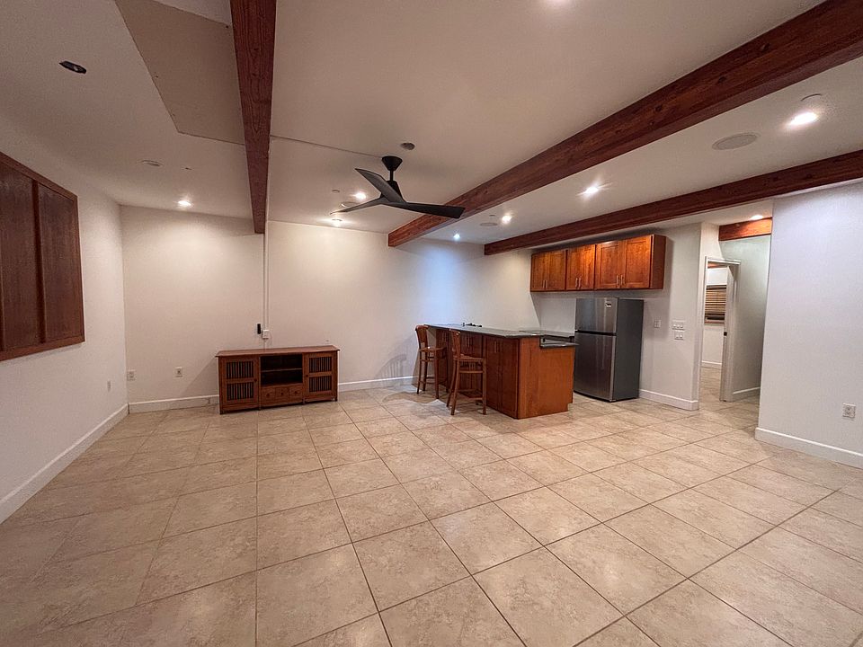 Another angle of living space; with new Stainless Steel Fridge!
