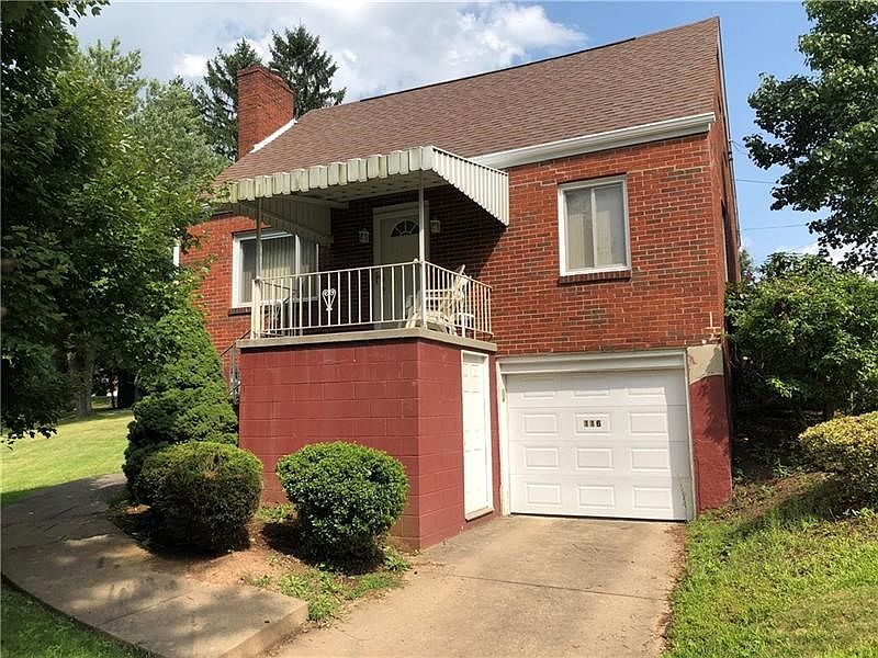 Welcome to 116 Warren Dr.! Concrete driveway and sidewalks. Auto garage opener and storage shed under front porch.