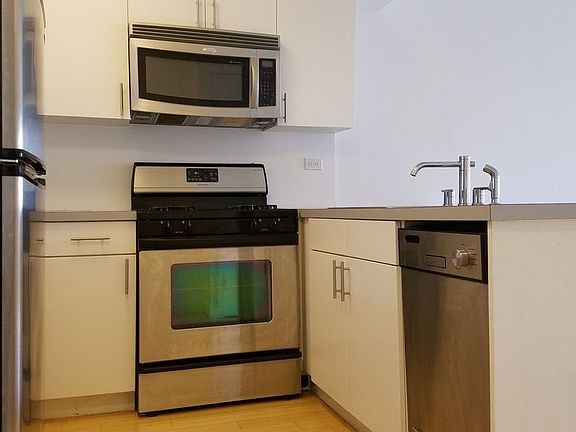 5th image of 252 E 2nd St APT 4H
