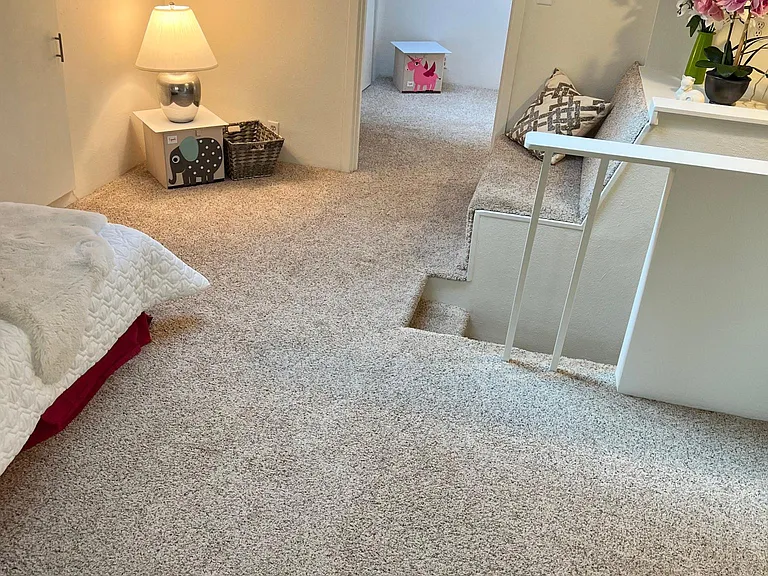 Loft is divided into two rooms.