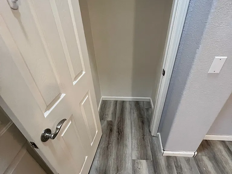 Coat closet by the entrance.